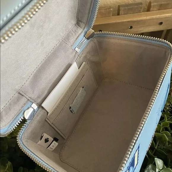 Kate Spade Bon Voyage Off The Grid Trunk crossbody